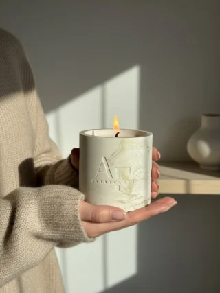 Instagram post from auraflamescandle. This post is in position 4.